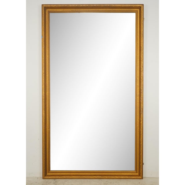 Victorian style mirror with a gilt finished carved wood frame, reclaimed from a school. There are some scuffs on the...
