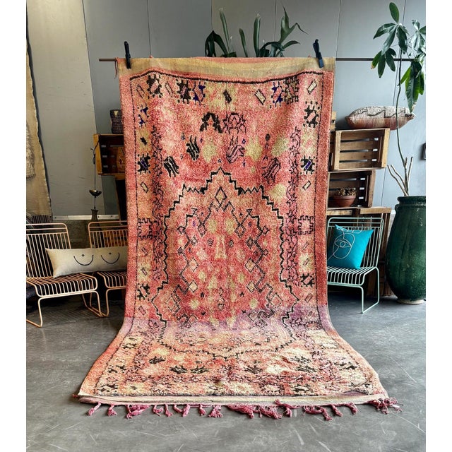 Bring timeless charm and bohemian elegance to your space with this authentic vintage Boujad rug from the Haouz region of...