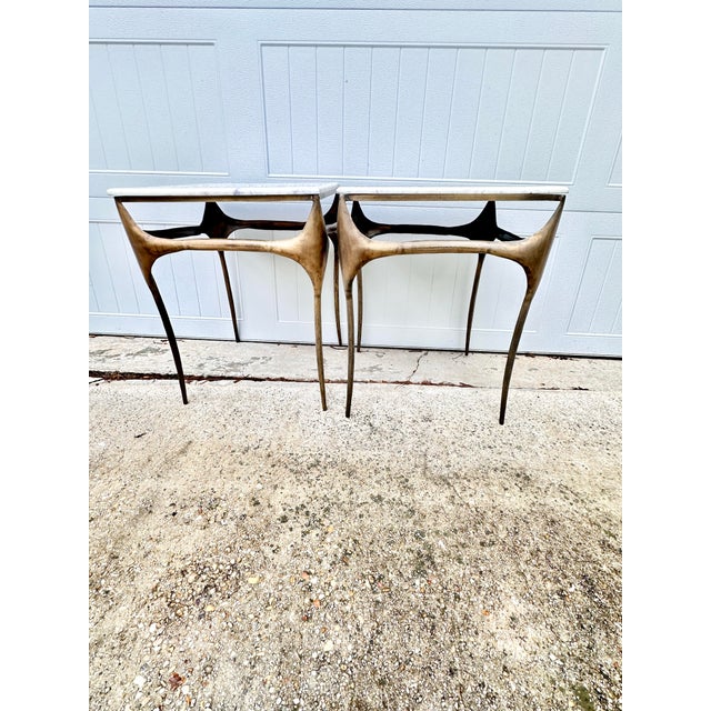 Stunning pair of vintage side tables. In a Brutalist style and styled after Paul Evans. The top is stone- like a marble....
