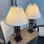 Design Plus Gallery presents a Pair of Modernist Lattice Tower Table Lamps. Each lamp has an open metal tower base with...