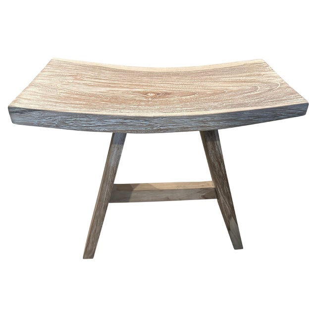 Sleek minimalist bench or stool hand made from a single slab of reclaimed teak and finished with a white wash revealing...