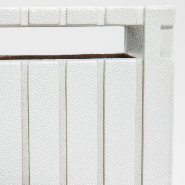 The White Shagreen Detail Waste Bin by R&Y Augousti is a masterful blend of elegance and functionality, crafted with...