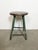 Vintage Industrial factory stool made in former Czechoslovakia during the 1960s It features a wooden seat and a green iron...