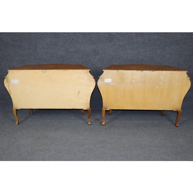 Dimensions: 29 1/2 inches high x 60 inches wide x 32 1/2 inches deep A striking and architecturally expressive pair of...