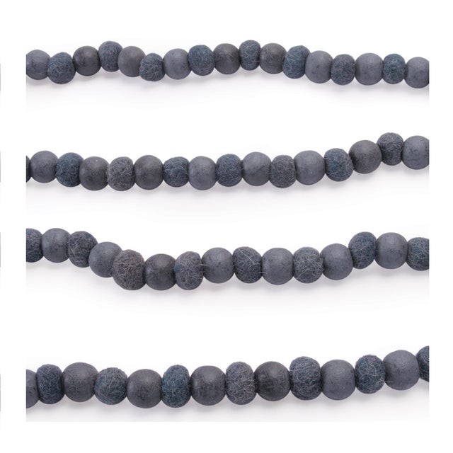 Add a touch of rustic charm and modern farmhouse style to your décor with this Gray Wood Bead Garland Set. Featuring...
