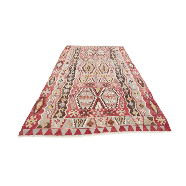 Vintage handwoven decorative kilim rug from Denizli region of Turkey. Approximately 50-60 years old. In very good condition.