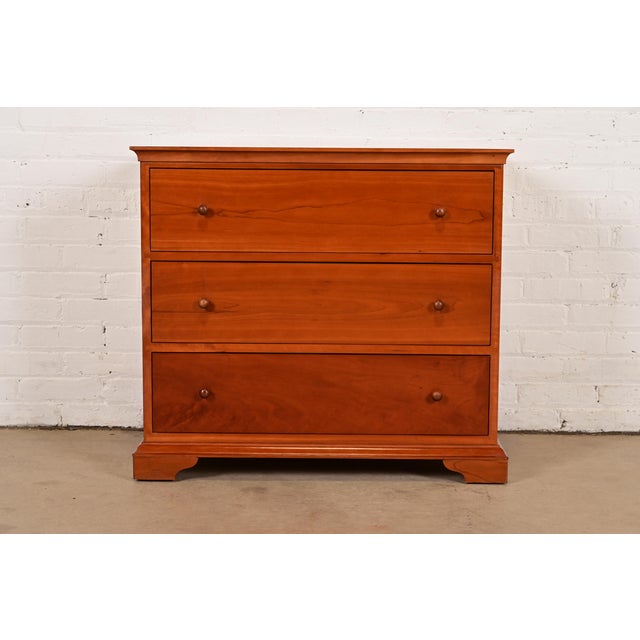 A gorgeous Mission, Arts & Crafts, or Shaker style solid cherry wood three-drawer dresser or chest of drawers By Harden...