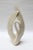 Large, elegant ceramic swan sculpture by Haeger (ca. 1980s, USA). Features a smooth, matte off-white glaze and applied...