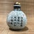 This is a charming vintage porcelain snuff bottle, crafted in the style of traditional Chinese Ge ware (Ge yao),...