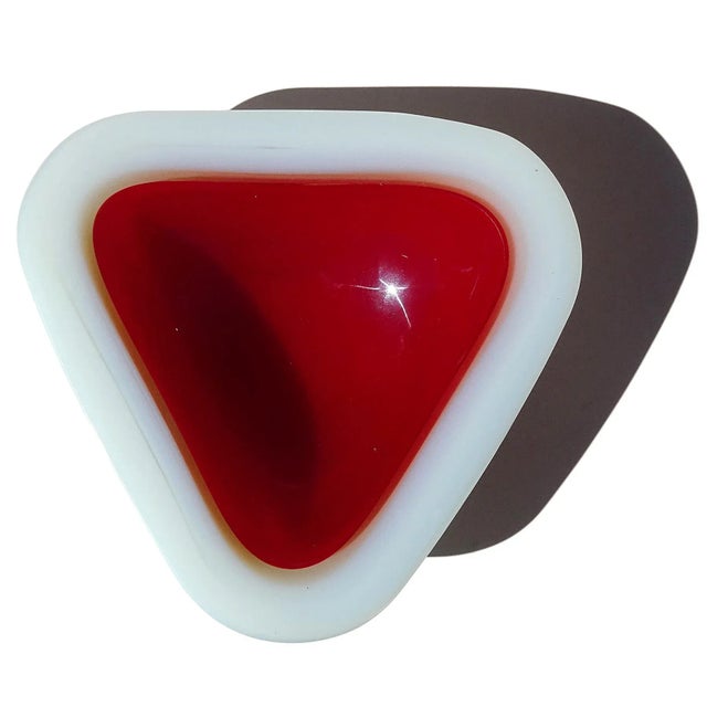 Beautiful vintage Murano hand blown opalescent white and deep red Italian art glass triangle shaped bowl. Attributed to...
