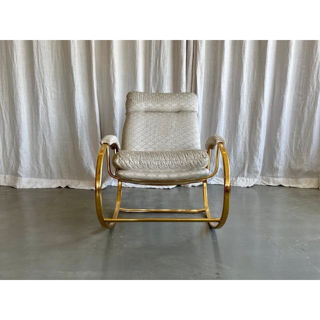 Beautiful Italian mid century upholstered rocking chair by Guido Faleschini, 1970s. A true mid century classic which...