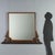 Freestanding mirror crafted from carved and ebonized walnut, originating from late 19th century Italy. The piece is...