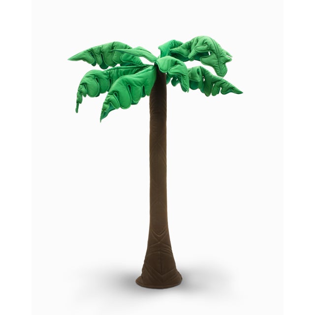 Here is a super fun and large fabric "soft sculpture" of a palm tree with posable leaves. It measures approximately 77"...
