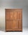 A distinctive Louis Philippe vitrine featuring mesh doors instead of glass, giving it a unique and textural appearance....
