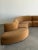 W170 D145 D54 D39 H31 SH18 SD26 No floor model available at this time This dramatic sectional features a curved silhouette...