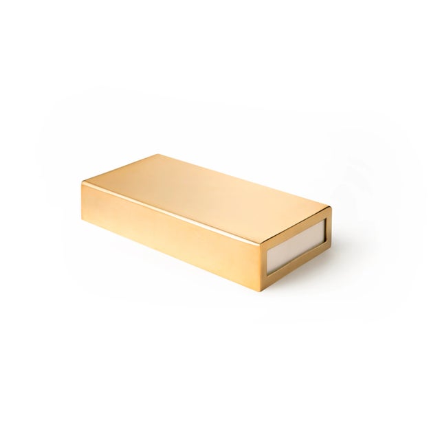 A beautiful solid brass box to hold oversized matches, this piece features a cutout on one side for a matchbox’s strike...
