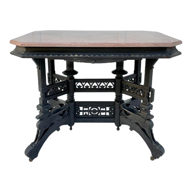 Antique Eastlake Pink Marble and Griffin Carved Rolling Table For Sale
