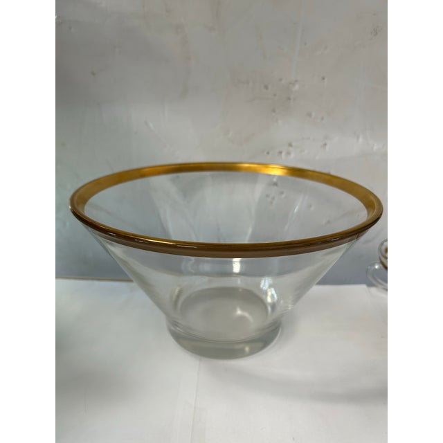 Beautiful punch bowl with 8 cups. Has a Hollywood Regency look with the simple gold band. Similar to Dorothy Thorpe...