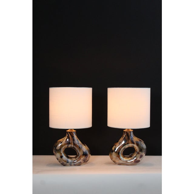 A petite pair of Seguso style lamps .Unusual sculptural form that creates more depth. Vibrant blend of earth tones...