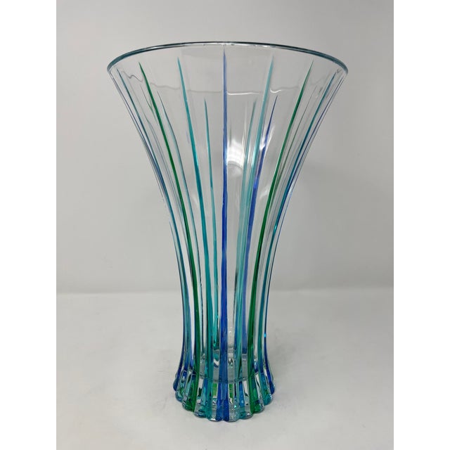 This lovely vase features incredible colors and it would be a wonderful addition to any room. Handcrafted in Italy of fine...