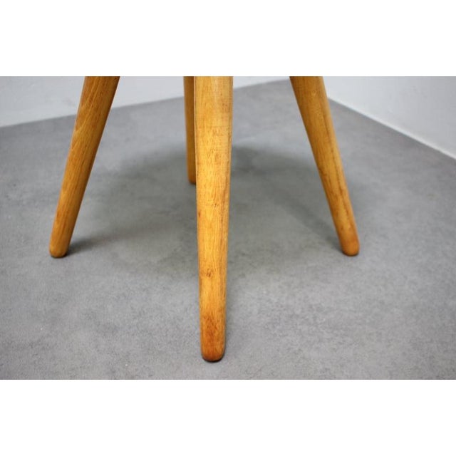 A rare and charming czechoslovak mid-century rattan stool designed by jan kalous for úluv in the 1960s. The stool features...