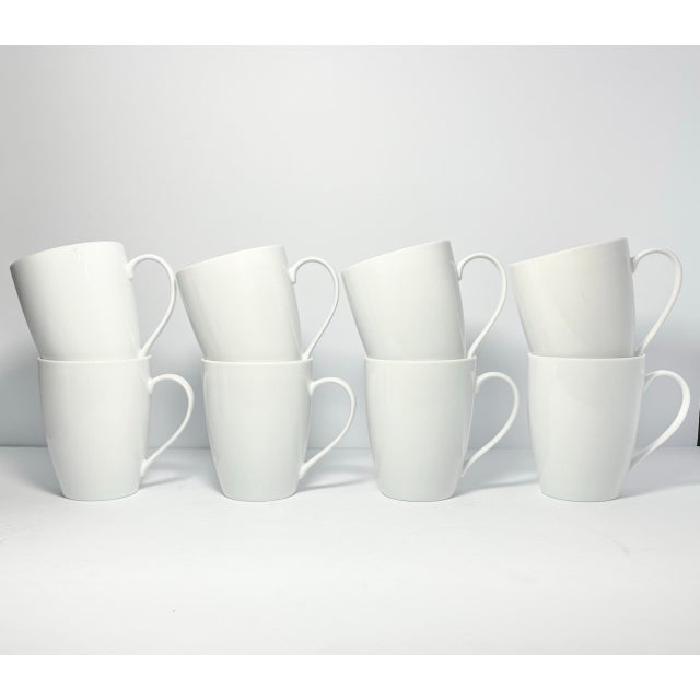 Crate & Barrel “Aspen” Set of 8 White Porcelain Mugs 4 1/2” 15oz Good condition. No chips, cracks, or fleabites. Length...