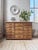 Vintage 1950s pine workshop cabinet. We love its compact design, with its many drawers. the handles are made of wood, the...