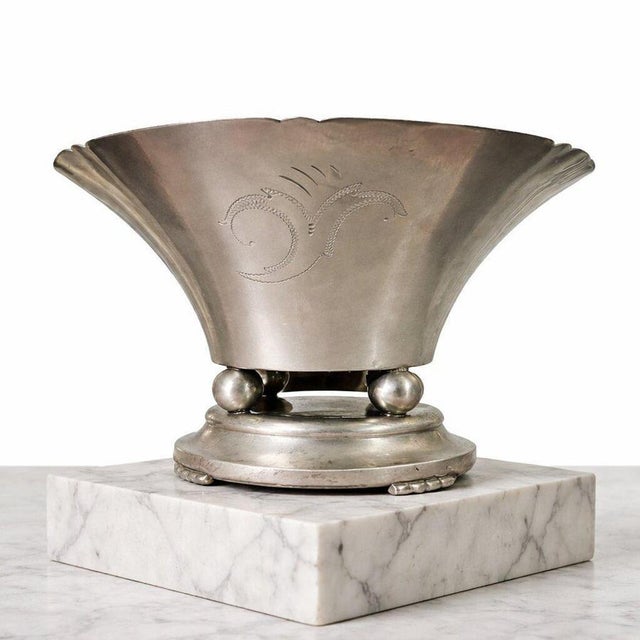 A striking swedish art deco centerpiece bowl in pewter, designed by folke arström for bröderna edlund and dated 1929. This...