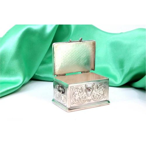 Chest-Shaped Silver Box with Reliefs and Applications, in Very Good conditions. Designed 1920 to 1949 This piece has an...