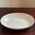 Offering an elegant vintage Lenox porcelain dish featuring a delicate embossed floral motif and classic ivory glaze...
