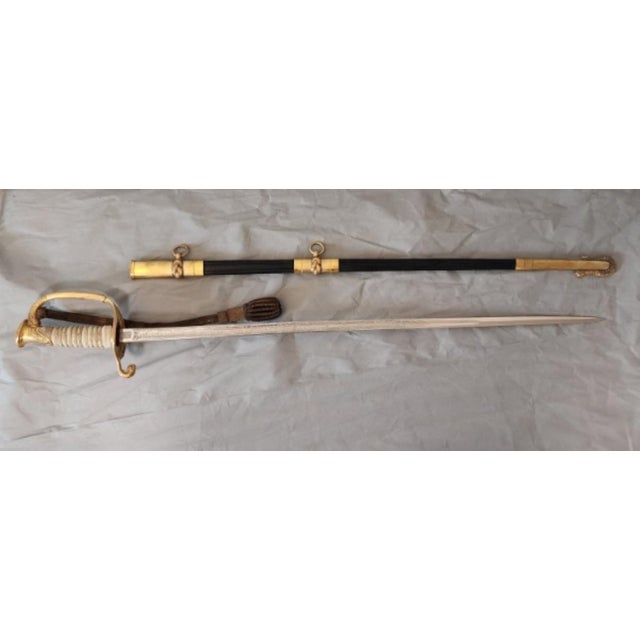 Command attention with this gilded naval accent. At 35" long and 2 lb 2 oz, the organic texture of the shagreen (rayskin)...