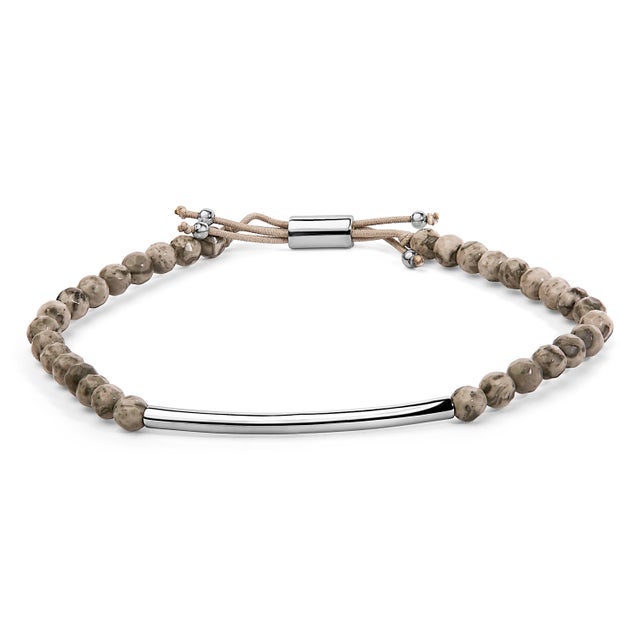 Experience the touch of nature’s artistry with this meticulously crafted bracelet, featuring ethereally patterned jasper...
