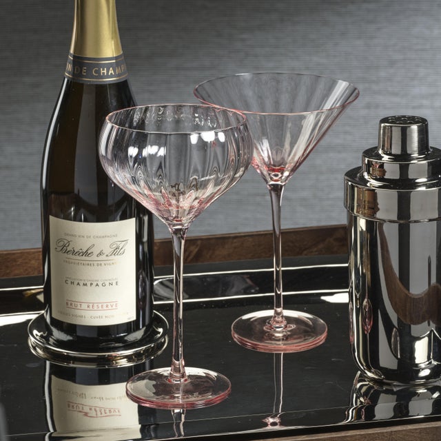 Crafted of beautifully textured glass, the colored glass set features a streamlined design with a pop of color. Set a...