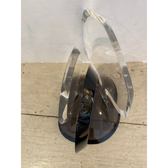A cool eye catching abstract lucite sculpture in black, clear and grey. Signed on base Van Teal.