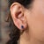 A matched pair of AAA-grade tanzanites glows in a rich violet-blue in these solid 14K gold oval solitaire stud earrings,...