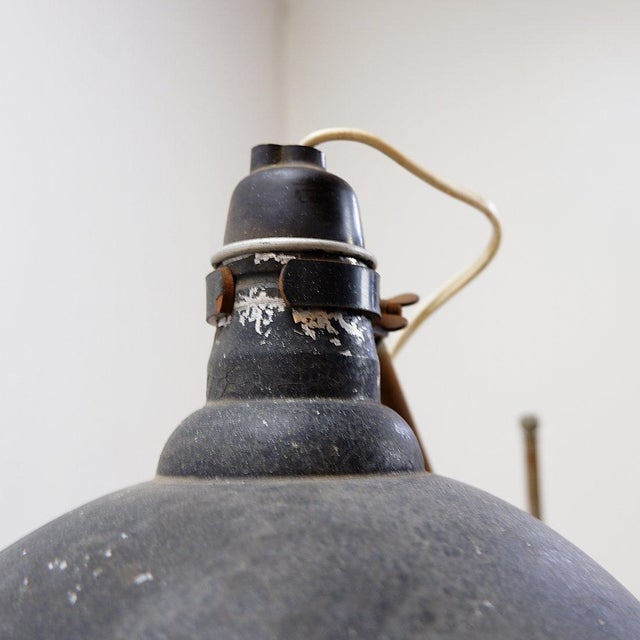 Industrial design the tripod base "a.d belgium" is an added element to the lamppost; it is not original. approximate...