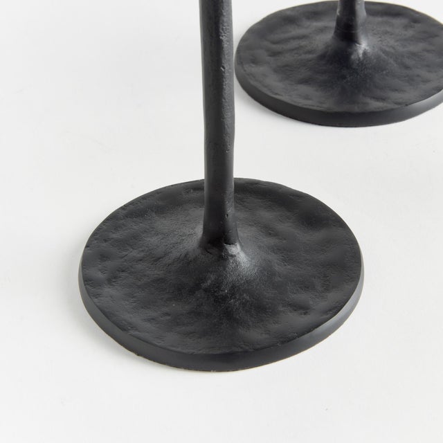With a dramatic taper at the bottom and rich texture, these grand taper holders are slender & tall modern works of art....