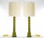 Handsomely crafted heavy green jade and gilt gold art deco style tall pair of table lamp. Each lamp features a stock of...