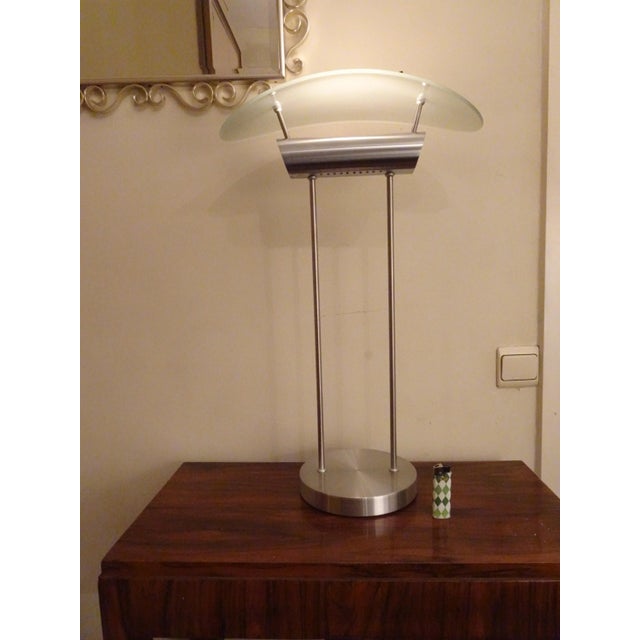 Impressive large lamp with a good stylished design appereance. This lamp can be adjusted in lighting. Works with a dimmer....