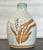 Beautiful vintage Japanese sake bottle, handmade and marked with the artist’s seal. Crafted in a rustic, natural Bizen...
