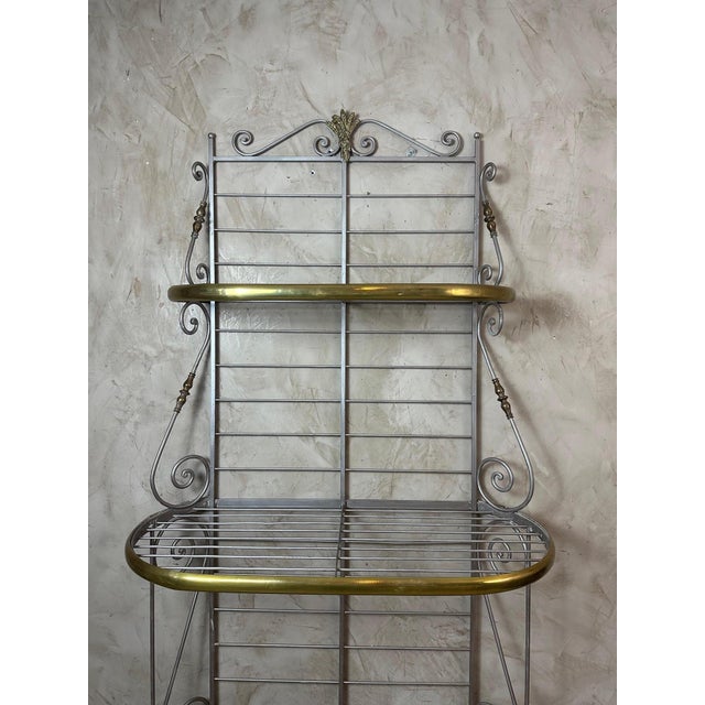 Superb metal bakery shelf from the 1950s, in good condition. It features an elegant wrought iron structure, embellished...