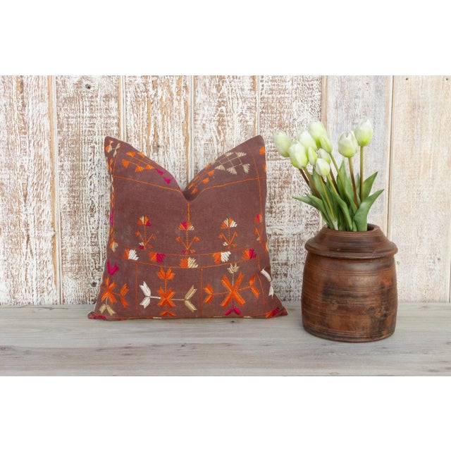This colorful and luxurious Bagh Phulkari pillow features beautiful hand-done silk embroidery on top of a cotton fabric....