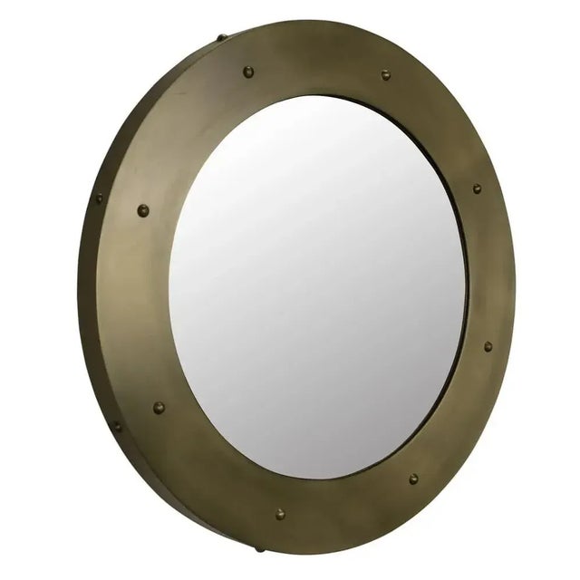 Round mirrors with dimensionally embellished metal frames, the Clay mirrors by Noir are available in two sizes and two...