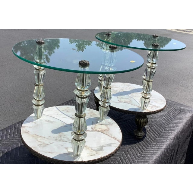 A Pair of Goran Églomisé Hollywood Regency Side Tables. A vintage pair of two-tier side and end tables, produced in...