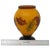 A unique yellow and brown cameo glass flower made for Teleflora in the 1970s. The body has leaves and fruit in relief...