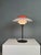 An iconic ph 80 table lamp, designed by poul henningsen and produced by louis poulsen in denmark around 1970. Part of the...