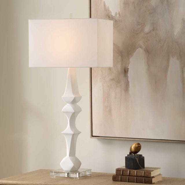 The Mayme Table Lamp Features A Unique Stacked Sculptural Design Finished In Matte White, Accented By A Thick Crystal Foot...