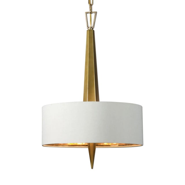 An Elegant Chandelier With A Sleek Vertical Ceramic Center In A Warm Gold Finish Evokes An Art Deco Feeling With A Beige...