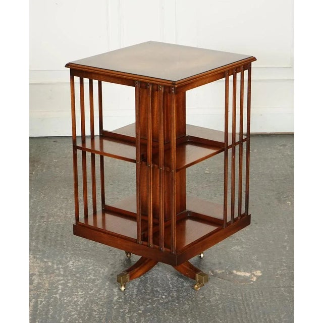 We are delighted to offer for sale this Beautiful Bevan Funnell Revolving Bookcase with Brass Feet. A very well made and...
