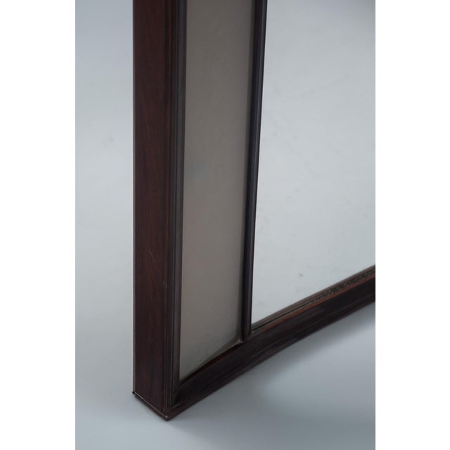 Backlit mirror from the 1950s, a masterpiece of Italian craftsmanship that embodies the charm of vintage design. The...
